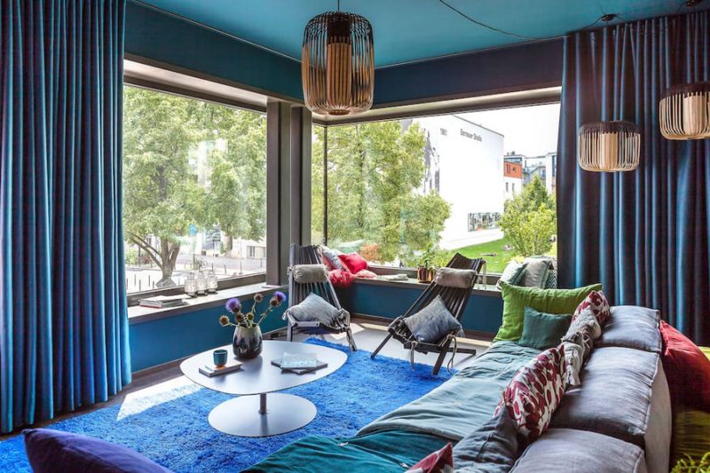 Blauwe woonkamer met een Aziatisch tintje
