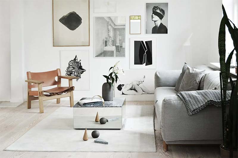 Deens design studio Kristina Dam heeft hier gekozen voor een prachtig cognac leren fauteuil.