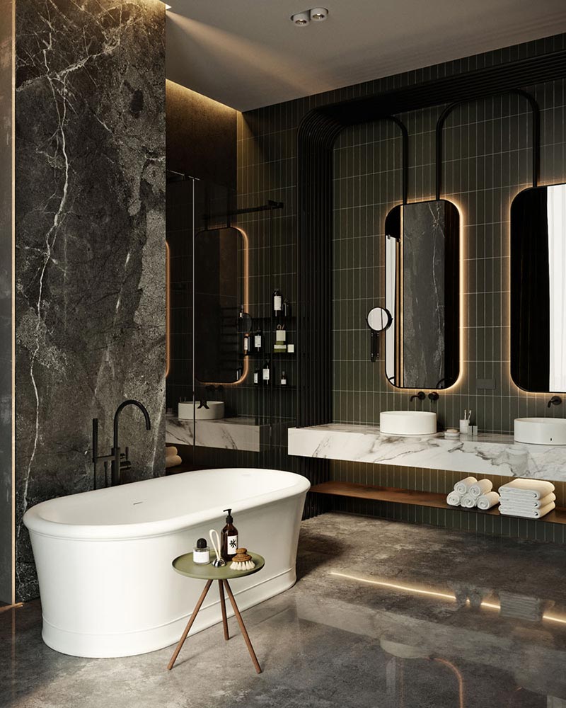 Deze luxe badkamer is ontworpen door TOL’KO interiors, die wandtegels met prachtige warmen wanden heeft gecombineerd bij het vrijstaand bad.