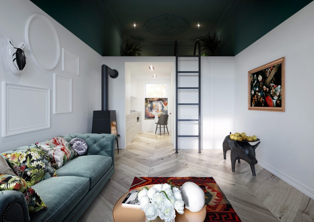 De houten vloer met het Hongaarse punt patroon in dit mooie kleine appartement zorgt voor een hele warme uitstraling.