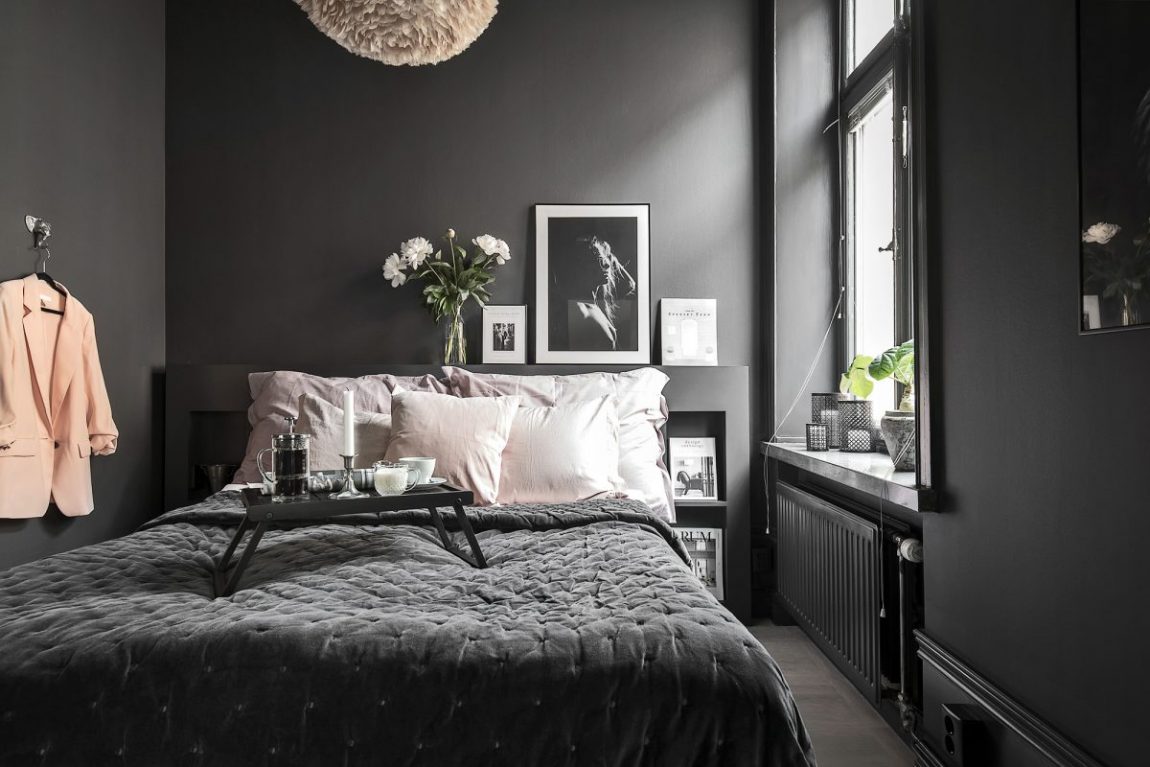 Scandinavische slaapkamer met zwarte muren