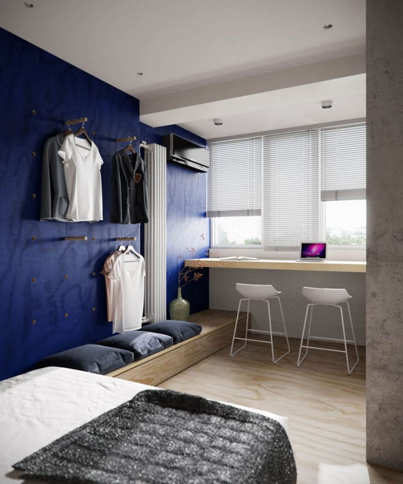 Stoere slaapkamer met een blauwe gaatjesbord muur